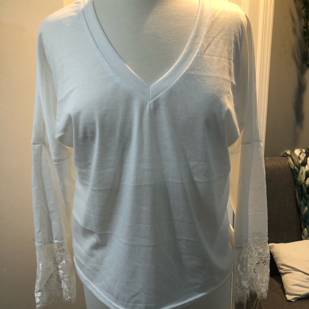White long sleeve shirt with lace detailing
